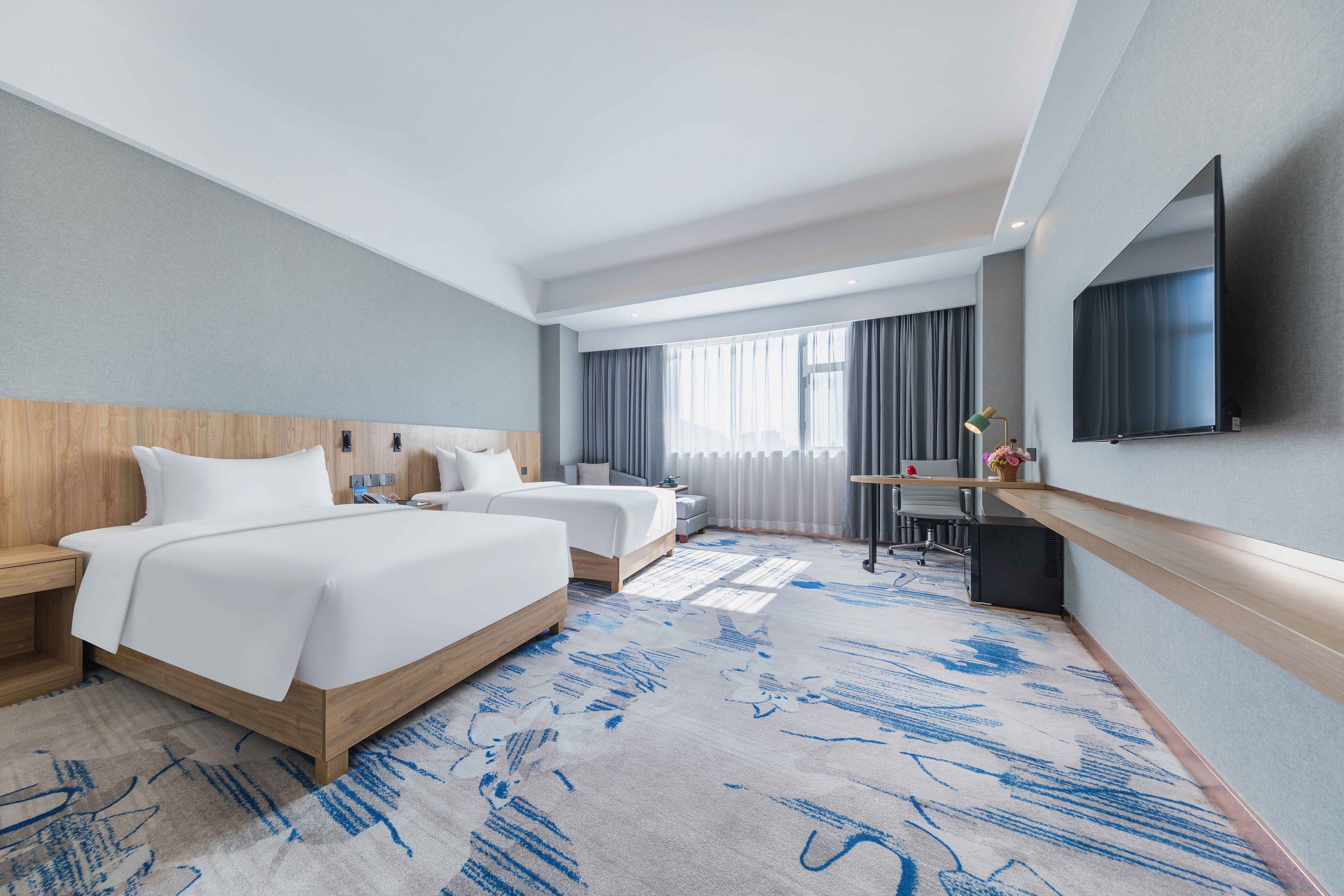 Zhuhai Huafeng Hotel (Huafa Commercial City Wanxuehui Branch)豪华双床房丨投屏电视丨澳洲羽丝棉安睡枕丨极速网络