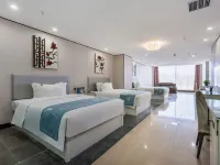 Pudong Holiday Hotel Hotele w: Aksu
