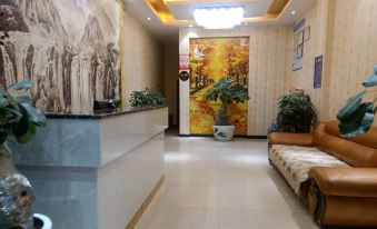 Qujing Xinyuan Business Hotel