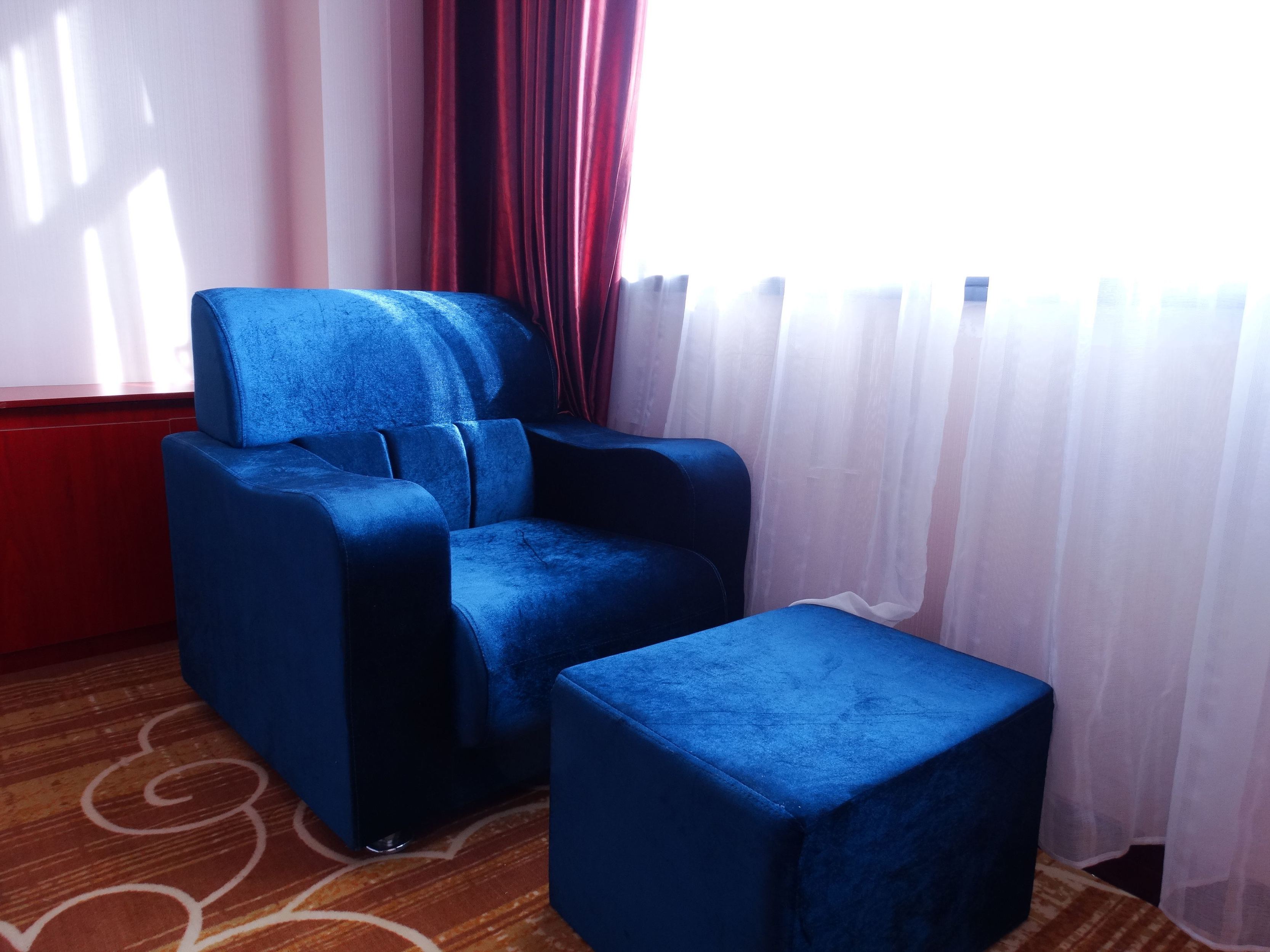 Mulei Sunshine Flower Garden HotelKing-size bed room