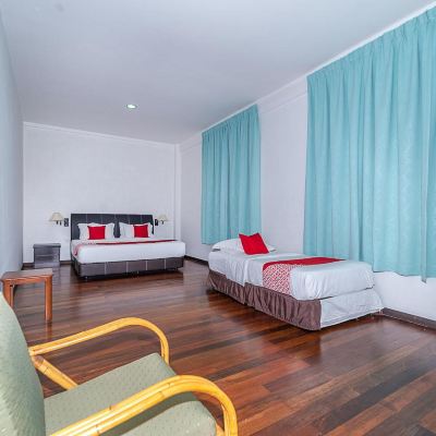 Deluxe Triple Room Kupon OYO 90036 Eagle Wood Garden