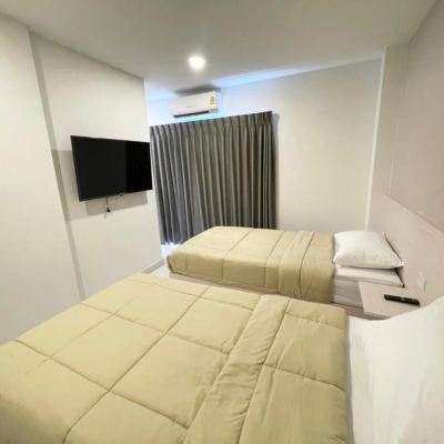 ห้องดีลักซ์ เตียงแฝด รหัสโปรโมชั่น มังกร โฮสเทล