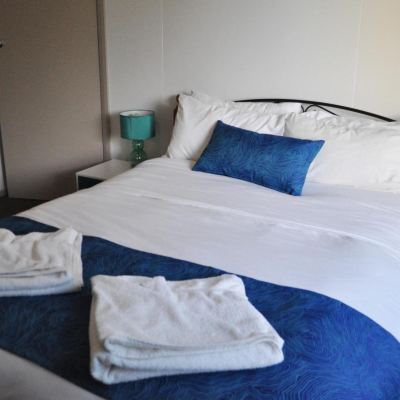 Deluxe Three-Bedroom Cabin Island Breeze Motel Promo Code