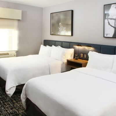 Two Bedroom Suite With One Queen Bed And Two Double Beds COSUITES SALTILLO HOTEL Promo Code