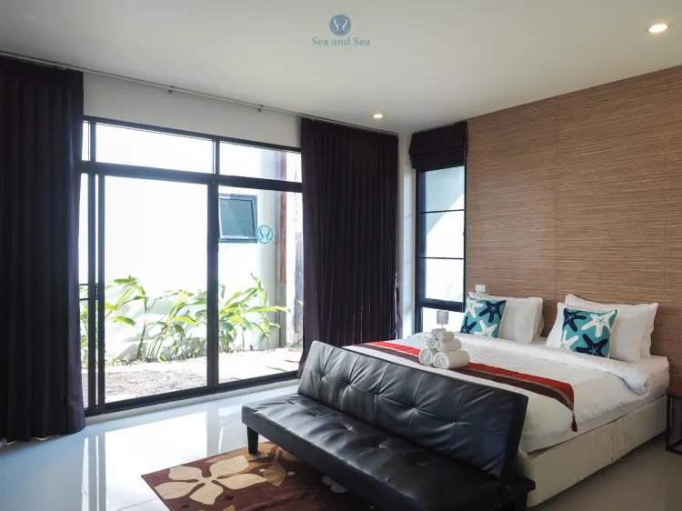 ห้องเตียงแฝดพร้อมลานระเบียงและวิวสวน