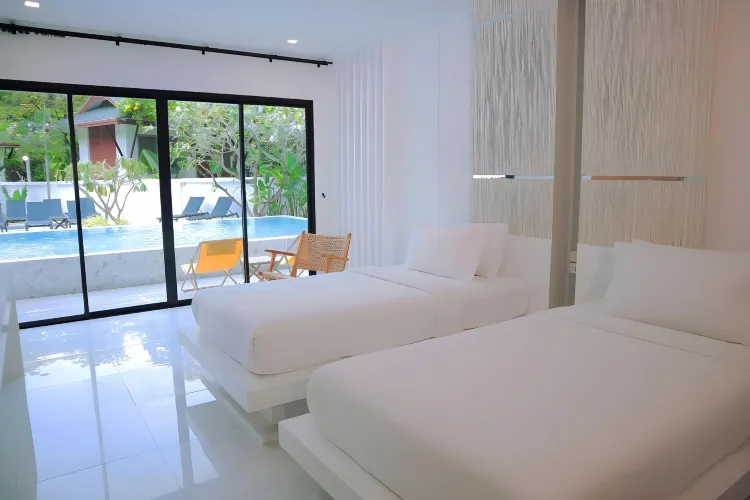 ห้องเตียงแฝดพร้อมทางสู่สระว่ายน้ำ