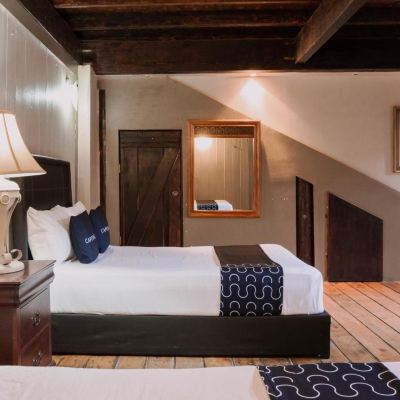 Standard Quadruple Room Capital O Hotel Villa Azura Promo Code