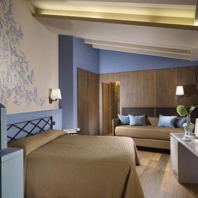 Junior Suite Titano Suites Promo Code