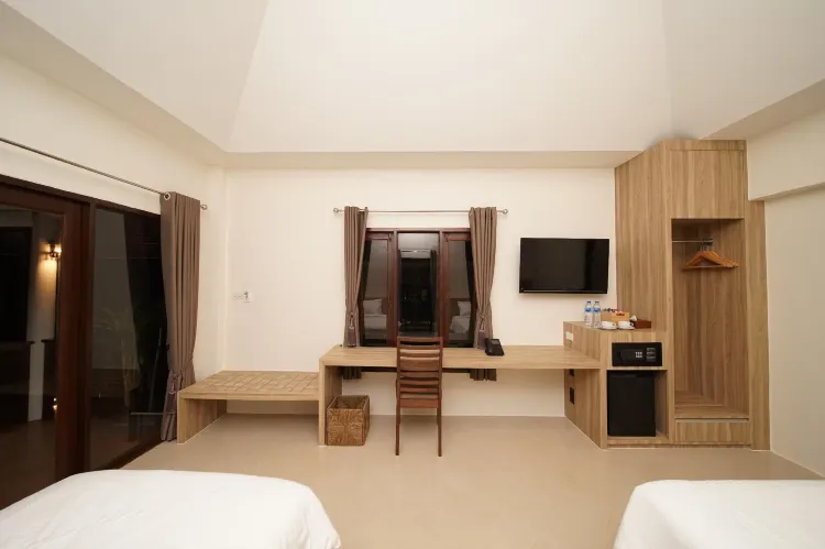 ห้องดีลักซ์ เตียงแฝด พร้อมระเบียง