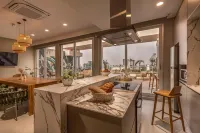 HOUZE Stay & Residences by AVA