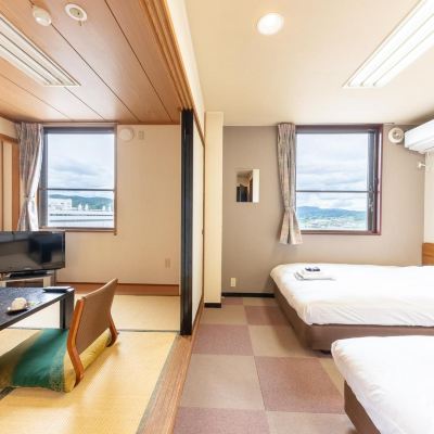 デラックスツインルーム(喫煙) OYOホテル トラベルイン 信州中野 クーポン