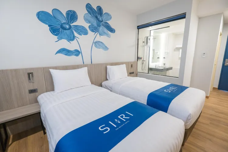 ห้องดีลักซ์ เตียงแฝด พร้อมวิวสวน