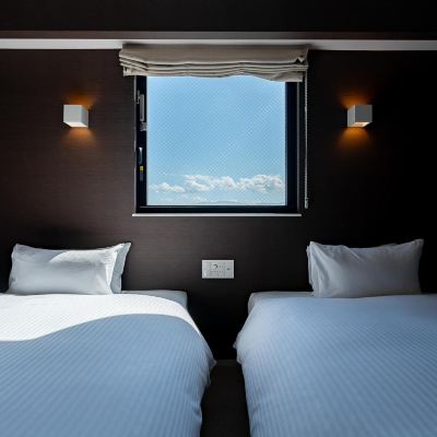 デラックスコーナーツインルーム カナメインタテマチ クーポン