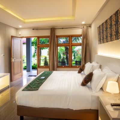 Deluxe Room King Bed Grand Harvest Resort & Villas Promo Code