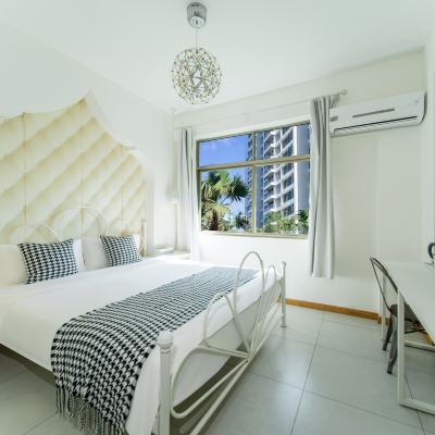 初見山景房 哪裡那裡海岸精品客棧（三亞大東海店）優惠