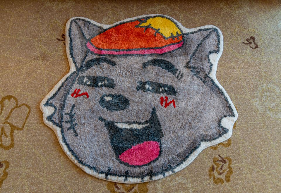 Beijing Xinjiang PlazaPleasant Goat And Big Big Wolf Theme Double Bed Room