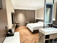 Ruicheng Hotel, Wusu City Ξενοδοχεία στην πόλη Γουούσο