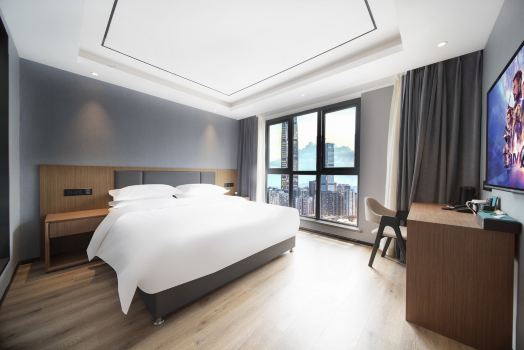 Yixi Hotel (Leshan High Speed Railway Station Shihao Plaza)