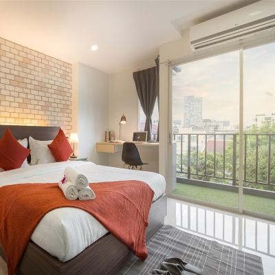 Deluxe Room With Balcony Q Space Residence Promo Code
