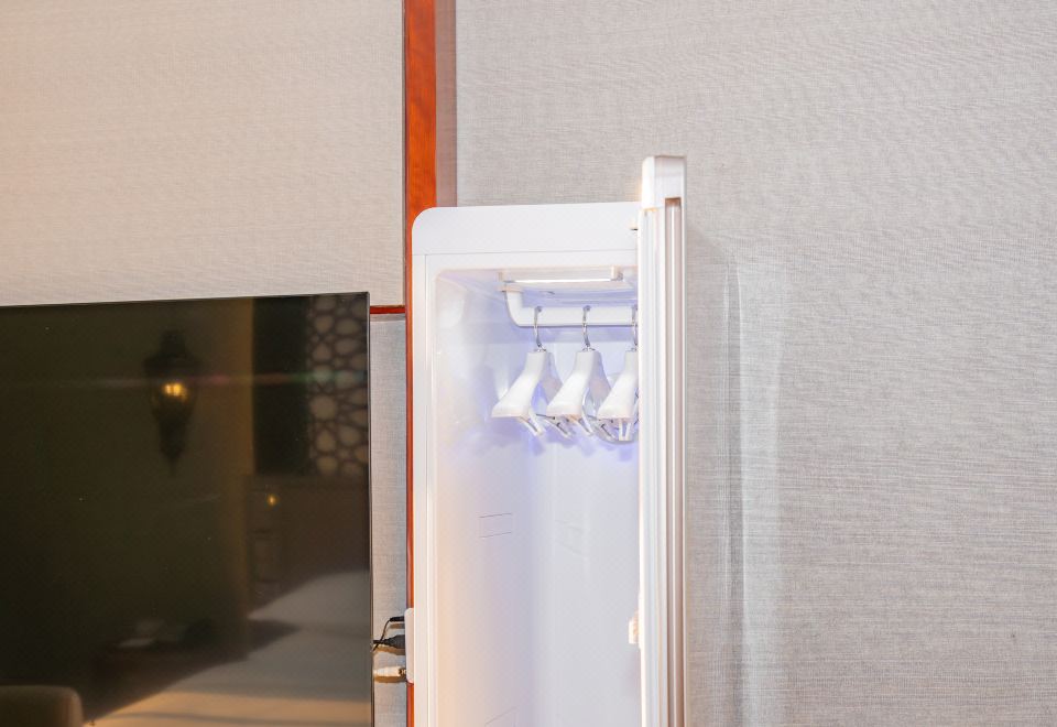 “衣然新尚”豪华大床房