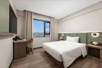 Meihao EZZI Hotel (Zhongshan Xiaolan Daxin Xinduhui) Отели в г. 