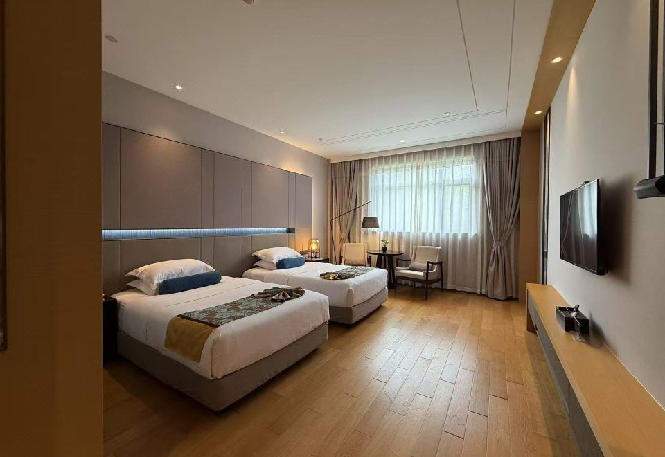 Yixing Bamboos International Conference CenterMountain View Twin Room--Overlooking Thousands Of Acres Of Verdant Bamboo, Enjoy A Leisurely And Carefree Experience.