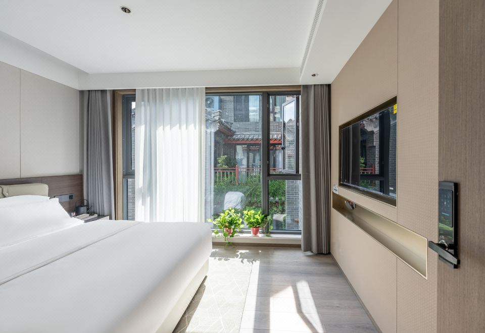 羽裳·奢美大床房『零壓床墊+漢斯格雅衞浴+智能客控+洗衣機烘乾機』