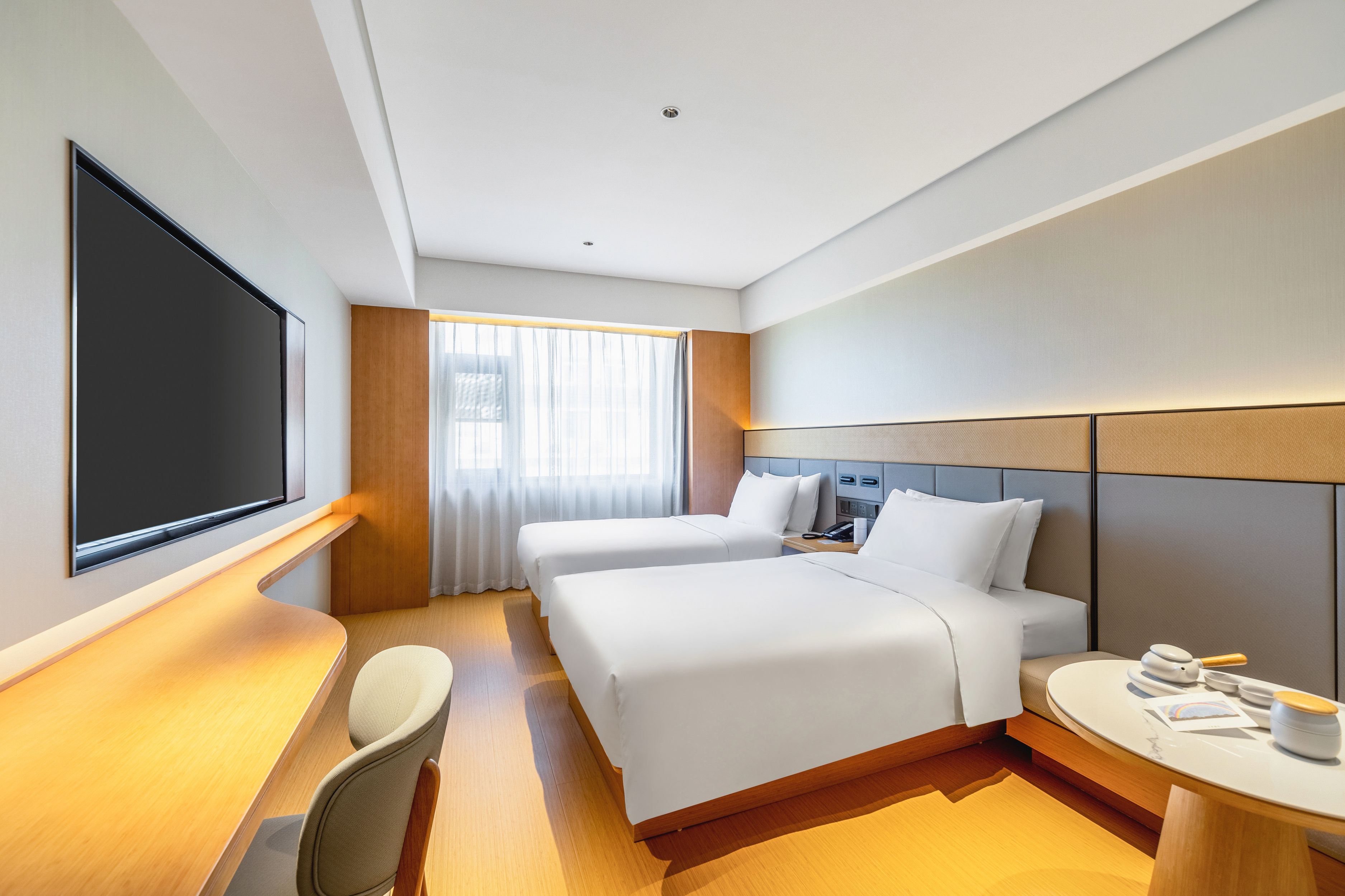 高级双床房（65寸投屏电视+小冰箱+深睡枕）