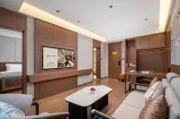Baocheng Zhixuan Hotel (Luoshan Dingsheng Plaza Branch)