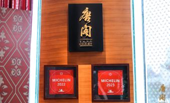 A gold plaque displaying the hotel's name and number is prominently placed at the front for easy reference at The Langham Shanghai Xintiandi