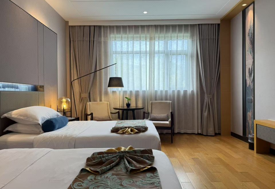 Yixing Bamboos International Conference CenterMountain View Twin Room--Overlooking Thousands Of Acres Of Verdant Bamboo, Enjoy A Leisurely And Carefree Experience.