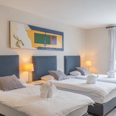 Superior Triple Room - (Top Floor) Ratchadamnoen Residence Promo Code