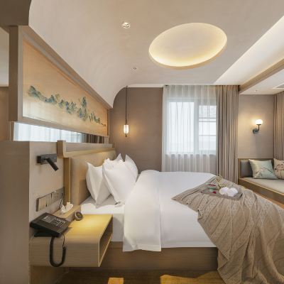 潑茶品書尊享套房 （茶室吧檯+智能馬桶+小冰箱+軟榻） 隱廬民宿飯店（鄭州火車站西廣場二七萬達廣場店）優惠