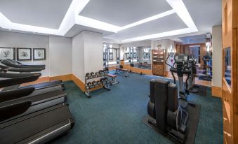 There is a spacious room with multiple exercise equipment and an indoor fitness center located in the center at Park Plaza Beijing Wangfujing