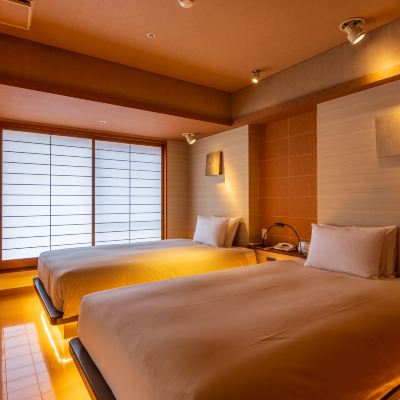 【川側】かけ流し露天風呂付和洋室+ツインベッド（陶器製お椀型） ホテル河鹿荘 クーポン