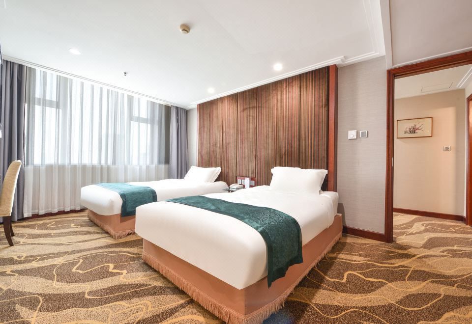 商务双床套房 | 独立会客区+深睡床品+mini冰箱