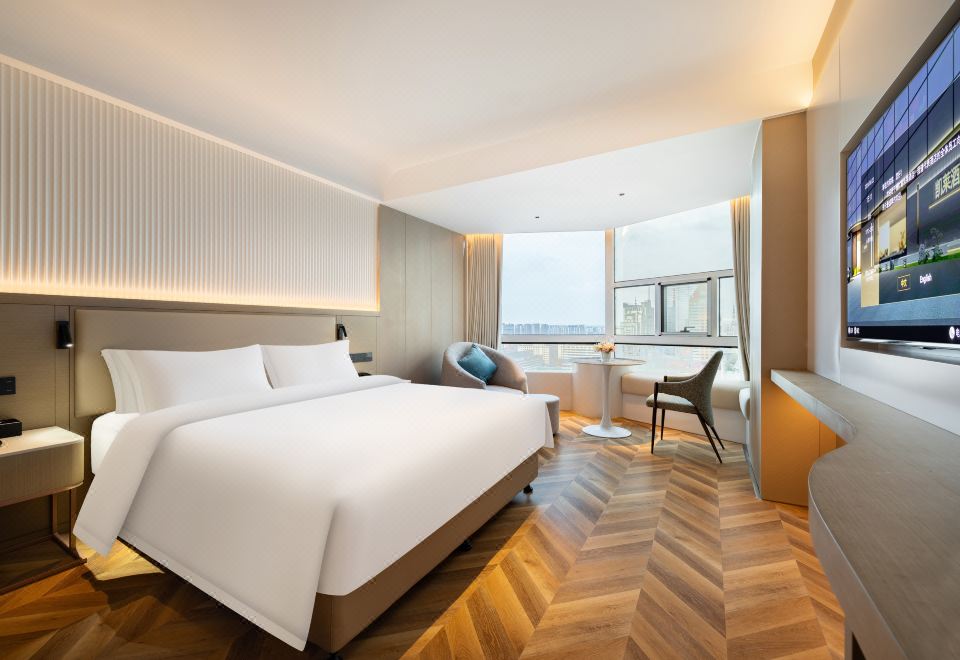 城景沙發大床房（舒適沙發+智能客控+小冰箱）