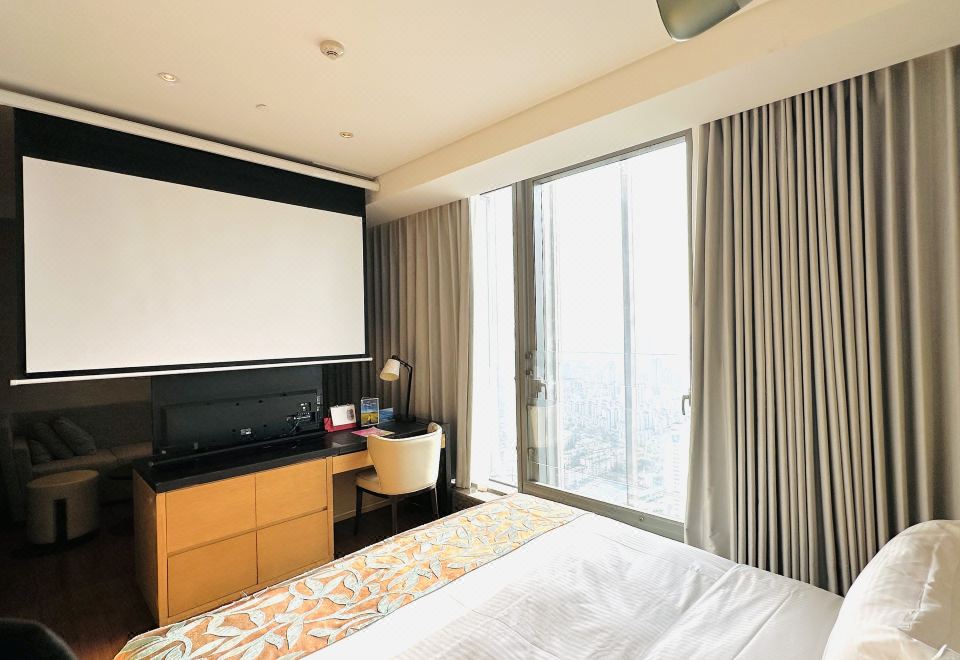 Ascott Central WuxiAudio-visual Executive Studio Apartment (90-inch Projection Screen + XGIMI M03 Bluetooth Remote)