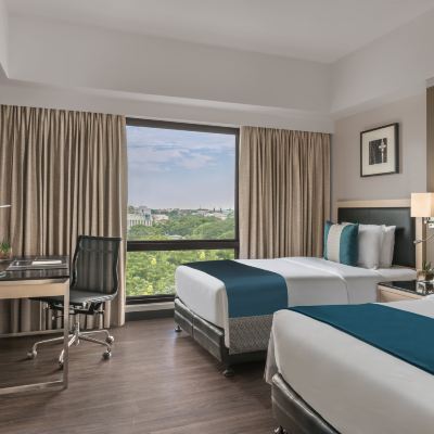 2 Single Beds, Standard Room Seda Capitol Central Promo Code