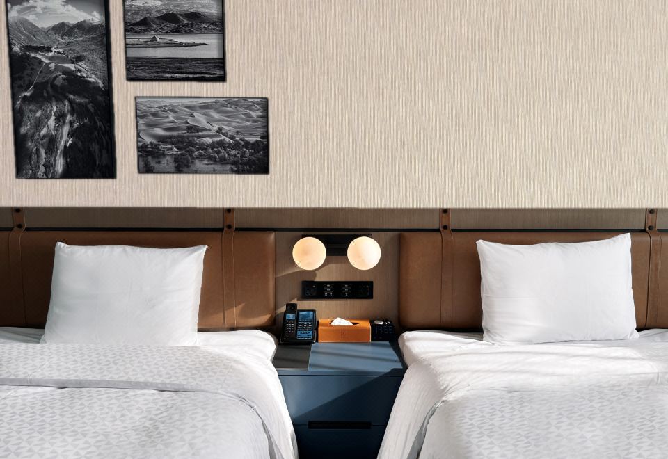 高级双床房（全景落地窗＋舒达舒睡床品）