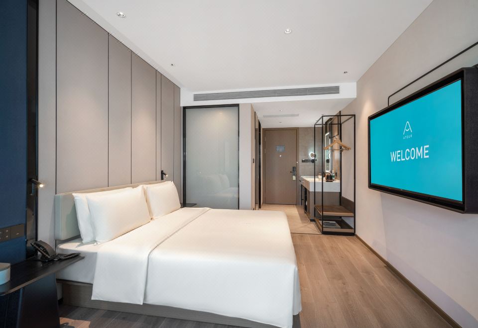 行政大床房（裸棉床品+投屏电视+小冰箱）