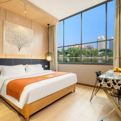 高級大床房【衞浴乾濕分離+通風采光極佳】 紫荊花連鎖酒店（南寧廣西大學東門店）優惠