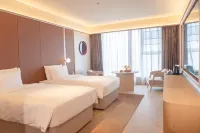 興義南站萬峯林機場桔子水晶酒店