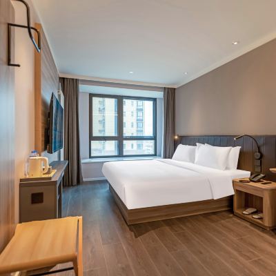 大床房（55寸高清投屏電視+200兆專線公共網絡） 漢庭優佳飯店（漢中火車站南廣場店）優惠