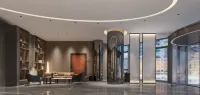 Aidu Chuangxiang Hotel (Wugang Baixing Plaza)