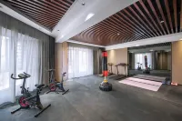 Menghai Boting Hotel (Xishuangbanna Menghai Mengbala International Resort Rainforest Avenue Branch)