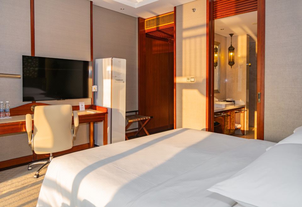 “衣然新尚”豪华大床房