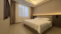 Xurisheng Hotel (Lianghe County Government Branch)