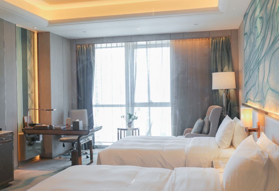 Wanda Vista NanningDeluxe Twin Hollywood Bed