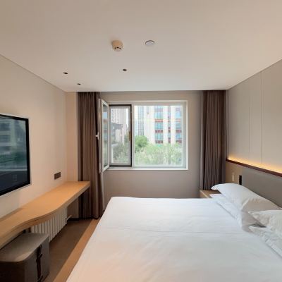 精選大床（智能客控+小冰箱） 和家賓館（北京清華店）優惠